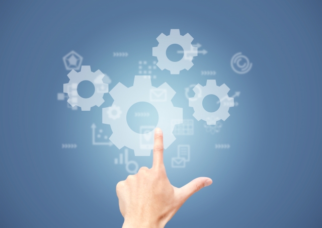 人の手と歯車のイラスト