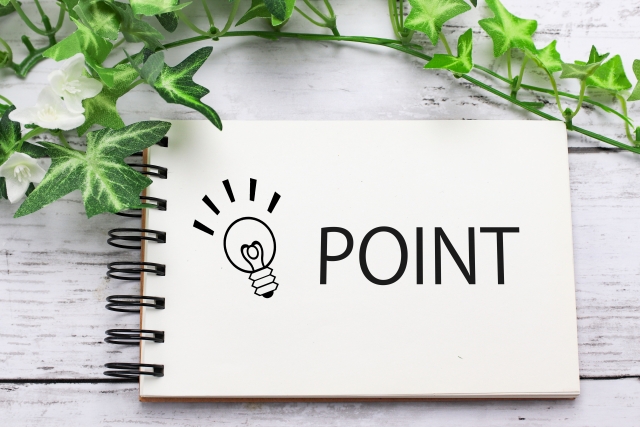 ポイントと豆電球の絵が書かれたノート